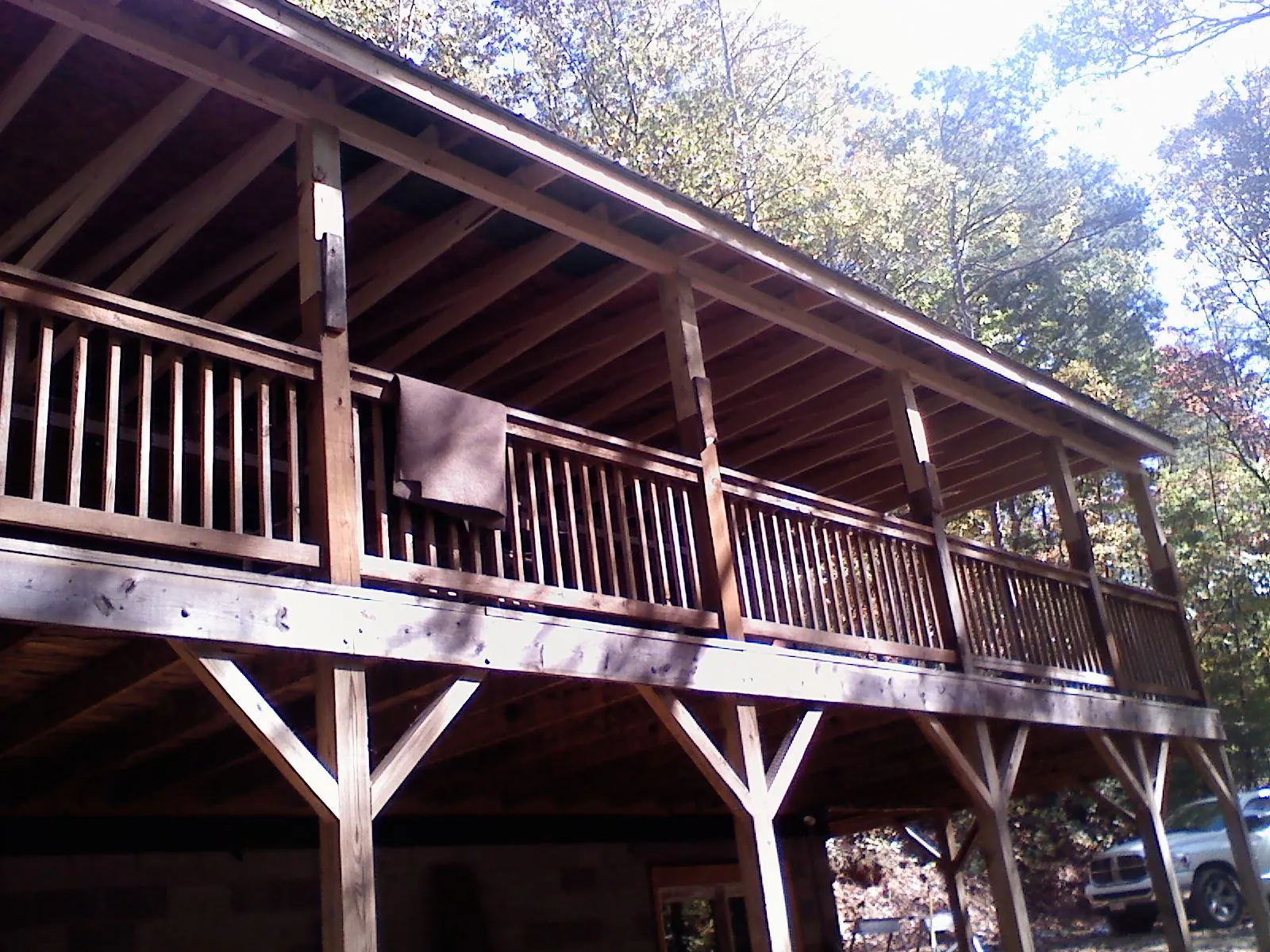 Timber framing under a new elevated porch and deck — Roof Leak Repair in Maple Heights by Roofing Brothers